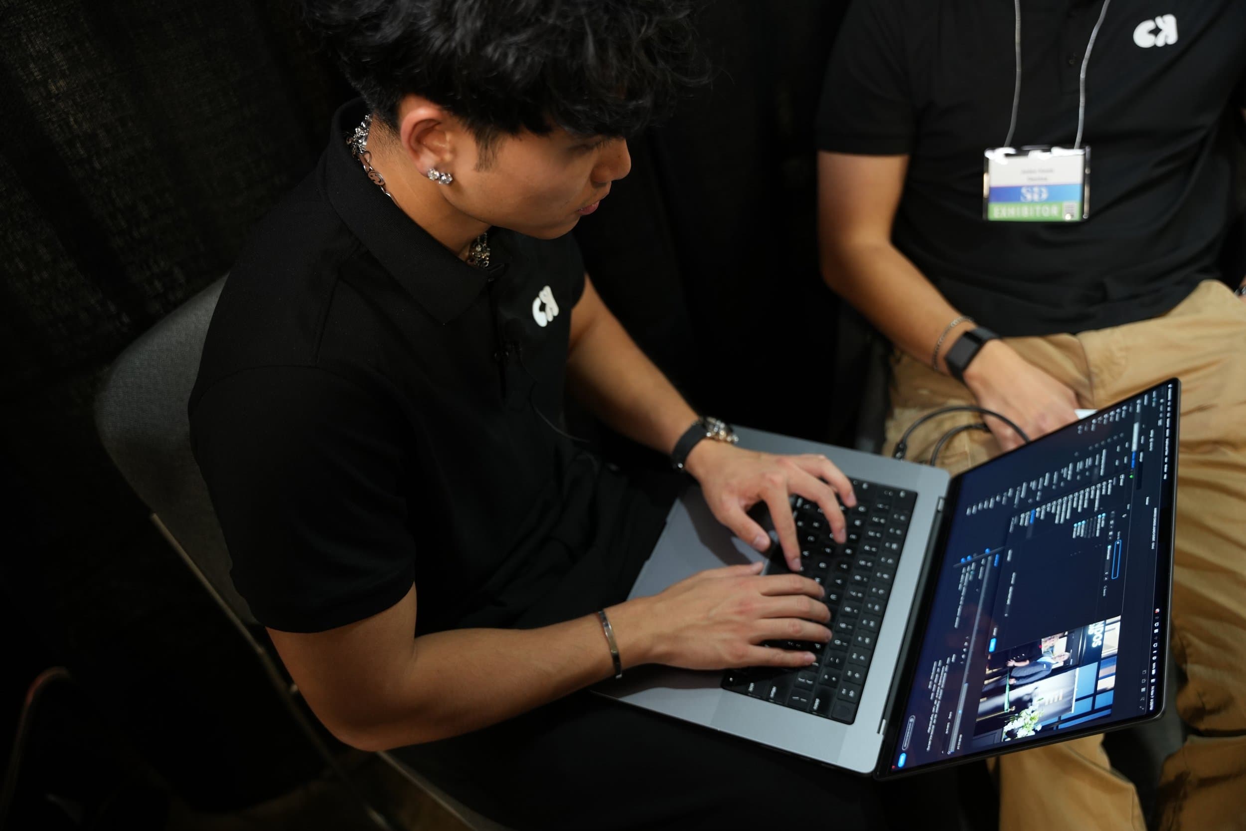 CK Studios team reviewing footage on a monitor